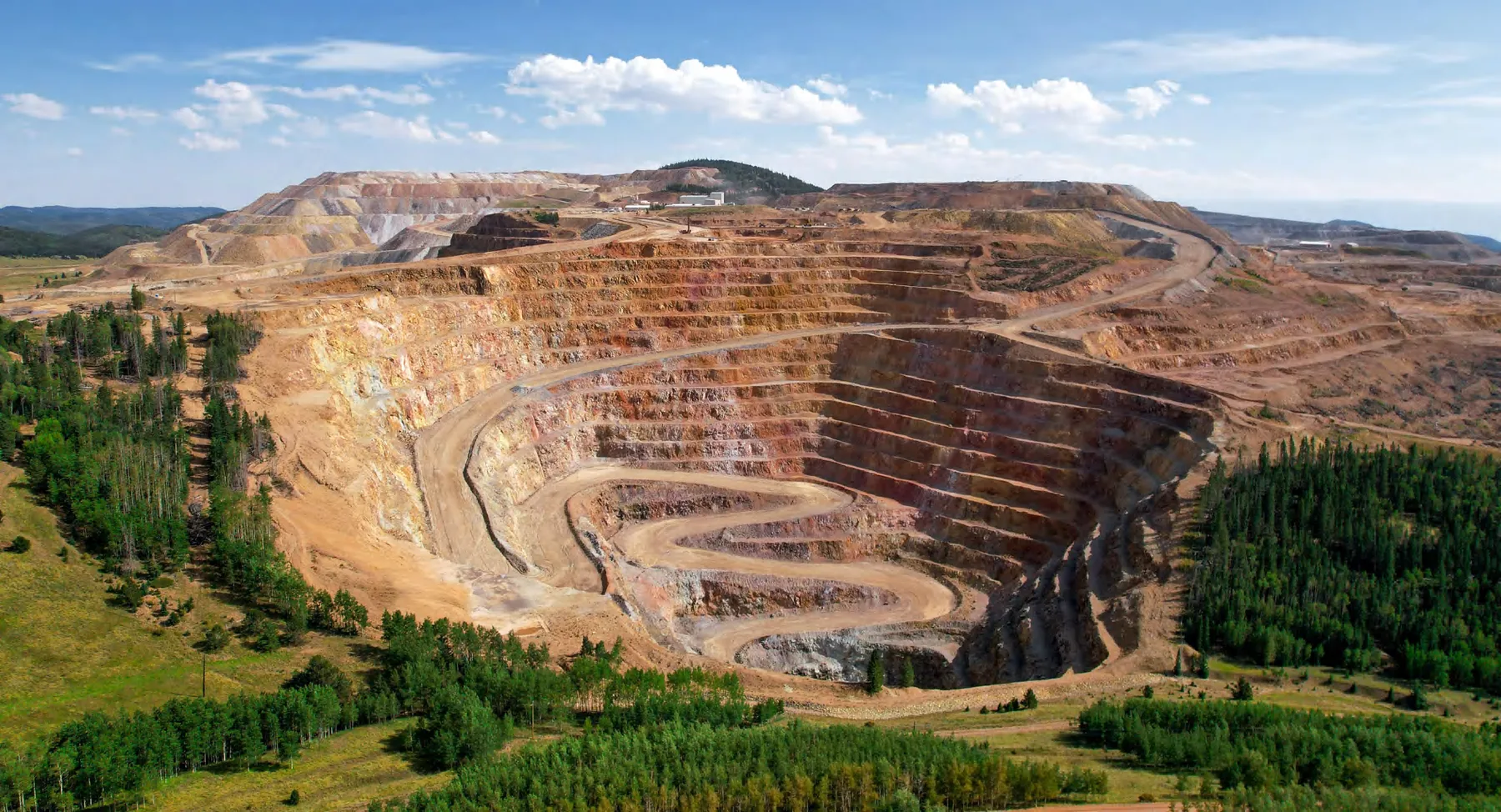 Aerial view of an open pit mine served by Xinhai